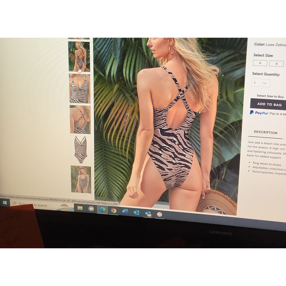 VENUS Luxe One Piece  worn 1 time. size 8 color is Luxe zebra